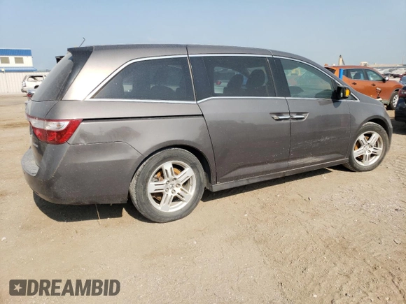 2013 Honda Odyssey with VIN 5KBRL589XDB803471, listed as a Copart auction lot 64465504 with Not provided miles and Non repairable. Bid and sale history available at DreamBid. Image 3.