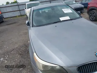 2005 BMW 5 Series 525i with VIN WBANA53535B857896, listed as a IAAI auction lot 42164290 with 207,711 mi miles. Bid and sale history available at carsss.com. Image 13.
