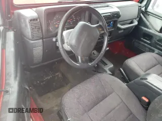 2002 Jeep Wrangler SE with VIN 1J4FA29P02P715013, listed as a Copart auction lot 48039035 with 193,583 mi miles and Salvage Title. Bid and sale history available at DreamBid. Image 8.