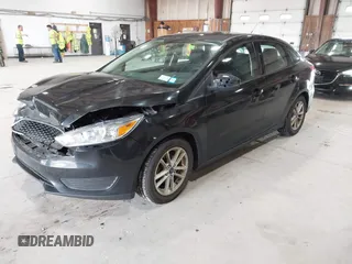 2018 Ford Focus SE with VIN 1FADP3FE8JL209560, listed as a IAAI auction lot 42707236 with 166,017 mi miles and . Bid and sale history available at DreamBid. Image 20.