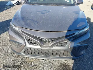 2021 Toyota Camry SE Nightshade with VIN 4T1G11AK2MU485544, listed as a IAAI auction lot 41000022 with 57,374 mi miles. Bid and sale history available at carsss.com. Image 12.