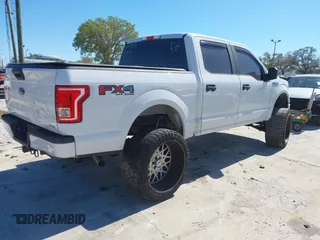 2016 Ford F-150 XLT with VIN 1FTEW1EF7GFB83167, listed as a IAAI auction lot 41676945 with 173,859 mi miles. Bid and sale history available at carsss.com. Image 4.