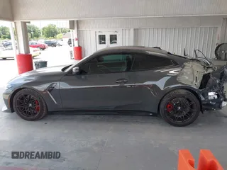 2024 BMW M4 Competition z VIN WBS33AZ00RCN69786, wystawiony jako IAAI lot #42279460 z przebiegiem 8614 mil mil oraz . Historia ofert i sprzedaży dostępna na DreamBid. Obrazek 15.