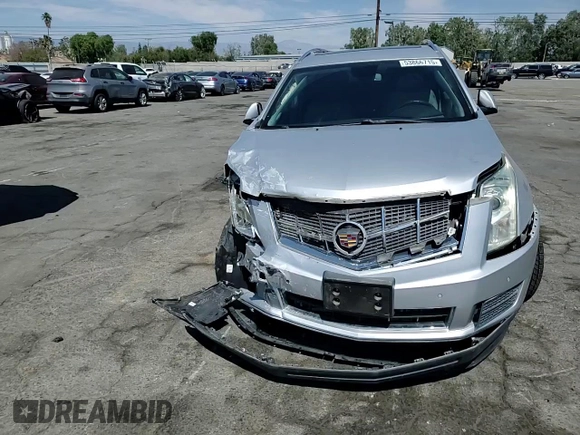 2012 Cadillac SRX Luxury Collection with VIN 3GYFNAE36CS653119, listed as a Copart auction lot 53866715 with 69,997 mi miles and Salvage Title. Bid and sale history available at DreamBid. Image 14.
