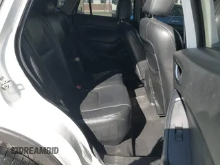 2016 Mazda CX-5 Sport with VIN JM3KE2BY9G0890587, listed as a IAAI auction lot 41685344 with 91,190 mi miles. Bid and sale history available at carsss.com. Image 8.