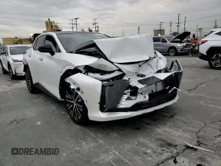 2023 Lexus RZ 450e Premium z VIN JTJAAAAB5PA009849, wystawiony jako Copart lot #81161103 z przebiegiem 4056 mil mil oraz . Historia ofert i sprzedaży dostępna na DreamBid. Obrazek 12.