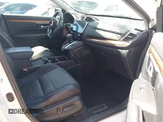 2017 Honda CR-V EX-L with VIN 2HKRW2H87HH650924, listed as a IAAI auction lot 42131606 with 72,415 mi miles and . Bid and sale history available at carsss.com. Image 5.