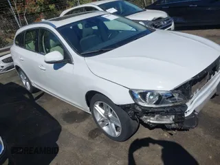 2015 Volvo V60 T5 Drive-E Premier with VIN YV140MEBXF1196500, listed as a IAAI auction lot 41848567 with 159,015 mi miles. Bid and sale history available at carsss.com. Image 1.