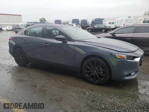 2025 Mazda 3 S Carbon Edition with VIN JM1BPBCM3S1767854, listed as a Copart auction lot 43643335 with 1,065 mi miles and Salvage Title. Bid and sale history available at DreamBid. Image 4.