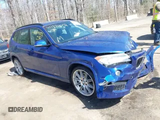 2015 BMW X1 sDrive28i with VIN WBAVM1C58FV314947, listed as a IAAI auction lot 41874472 with 128,271 mi miles. Bid and sale history available at carsss.com. Image 1.