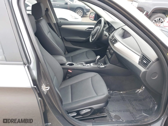 2013 BMW X1 28i with VIN WBAVM1C51DVW42577, listed as a IAAI auction lot 42029627 with 140,343 mi miles. Bid and sale history available at carsss.com. Image 5.