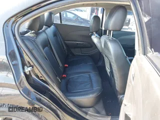 2012 Chevrolet Sonic LTZ z VIN 1G1JE5SH0C4154929, wystawiony jako IAAI lot #42191912 z przebiegiem 154 807 mil mil oraz . Historia ofert i sprzedaży dostępna na DreamBid. Obrazek 8.
