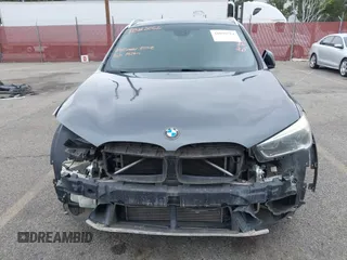 2016 BMW X1 xDrive28i with VIN WBXHT3C32GP886084, listed as a IAAI auction lot 41895754 with 85,662 mi miles and . Bid and sale history available at DreamBid. Image 6.