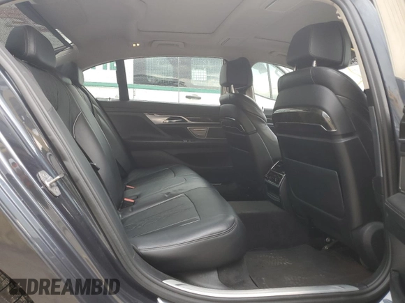 2017 BMW 7 Series 740i xDrive with VIN WBA7E4C32HGU99963, listed as a Copart auction lot 65848354 with 99,396 mi miles and Salvage Title. Bid and sale history available at carsss.com. Image 10.