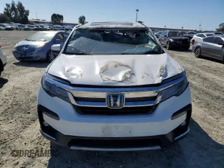 2021 Honda Pilot Touring 8-Passenger with VIN 5FNYF5H91MB015535, listed as a Copart auction lot 46845565 with 36,233 mi miles and Salvage Title. Bid and sale history available at DreamBid. Image 5.