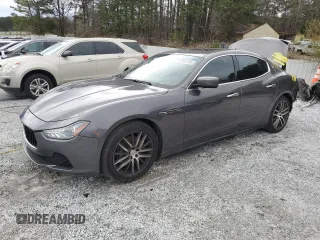 2014 Maserati Ghibli z VIN ZAM57XSA9E1096594, wystawiony jako Copart lot #47187285 z przebiegiem 114 050 mil mil oraz Szkody całkowita. Historia ofert i sprzedaży dostępna na DreamBid. Obrazek 1.