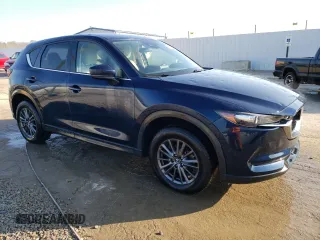 2019 Mazda CX-5 Touring with VIN JM3KFACM0K0639825, listed as a Copart auction lot 51140705 with 54,200 mi miles and Non Repairable. Bid and sale history available at carsss.com. Image 4.