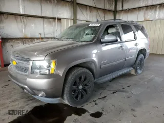 2014 Chevrolet Tahoe LT with VIN 1GNSCBE06ER245772, listed as a Copart auction lot 53747375 with 221,139 mi miles and Salvage title. Bid and sale history available at DreamBid. Image 1.
