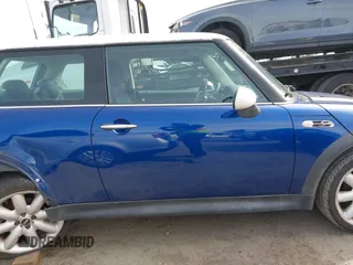 2003 MINI Hardtop S z VIN WMWRE33433TD72153, wystawiony jako IAAI lot #41601153 z przebiegiem 185 286 mil mil oraz . Historia ofert i sprzedaży dostępna na DreamBid. Obrazek 13.