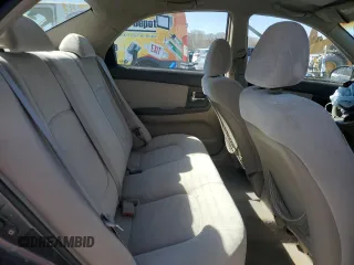 2004 Kia Spectra LX with VIN KNAFE121X45021922, listed as a Copart auction lot 49989845 with 184,189 mi miles and Salvage Title. Bid and sale history available at carsss.com. Image 11.