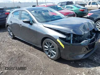 2021 Mazda 3 Select with VIN JM1BPBKLXM1337797, listed as a IAAI auction lot 42018058 with 46,763 mi miles and . Bid and sale history available at DreamBid. Image 1.