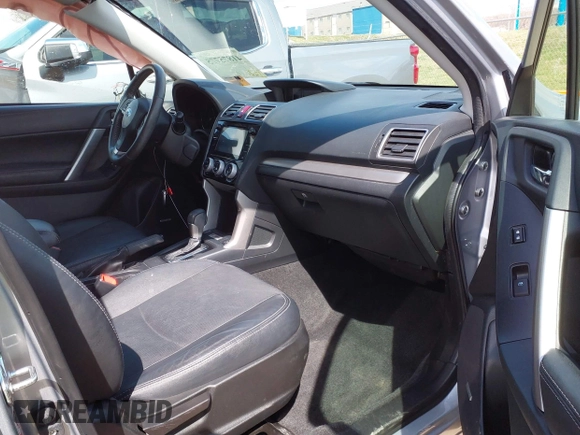 2016 Subaru Forester 2.5i Touring with VIN JF2SJAVC8GH493549, listed as a IAAI auction lot 41875775 with 74,767 mi miles. Bid and sale history available at carsss.com. Image 5.