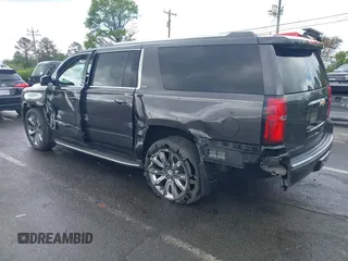 2015 Chevrolet Suburban LTZ with VIN 1GNSKKKC4FR589913, listed as a IAAI auction lot 42017190 with 216,145 mi miles. Bid and sale history available at carsss.com. Image 3.