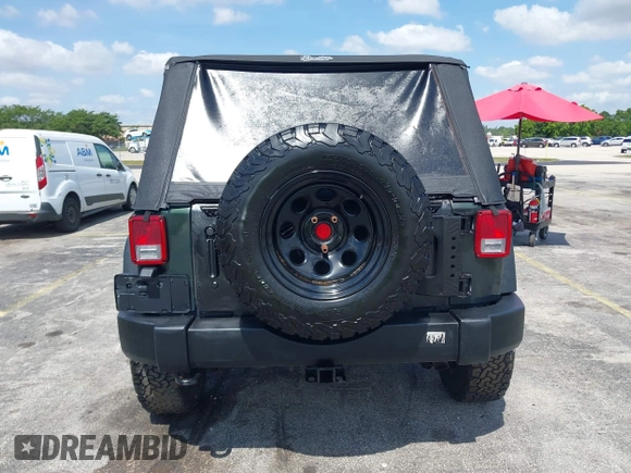 2010 Jeep Wrangler Sport with VIN 1J4AA2D17AL126737, listed as a IAAI auction lot 42237596 with 119,391 mi miles and . Bid and sale history available at carsss.com. Image 16.