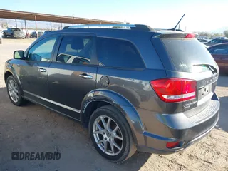 2014 Dodge Journey Limited with VIN 3C4PDDDG2ET175023, listed as a IAAI auction lot 41646669 with 112,663 mi miles and . Bid and sale history available at carsss.com. Image 3.