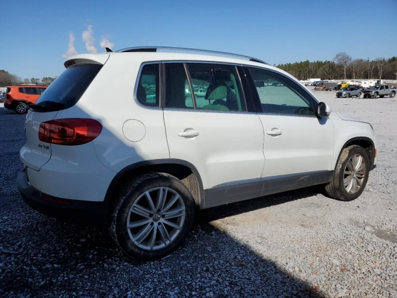 2015 Volkswagen Tiguan S with VIN WVGAV7AXXFW576514, listed as a Copart auction lot 45906025 with 90,302 mi miles and Salvage Title. Bid and sale history available at carsss.com. Image 3.