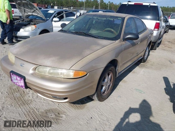 2004 Oldsmobile Alero GL1 z VIN 1G3NL52F14C137772, wystawiony jako IAAI lot #41850374 z przebiegiem 216 956 mil mil oraz . Historia ofert i sprzedaży dostępna na DreamBid. Obrazek 2.