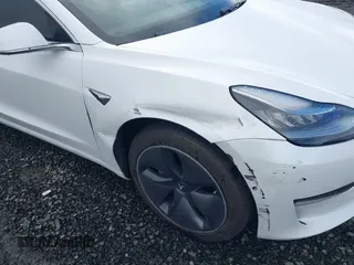 2018 Tesla Model 3 Long Range Battery with VIN 5YJ3E1EA3JF013253, listed as a IAAI auction lot 41752102 with 84,459 mi miles. Bid and sale history available at carsss.com. Image 6.
