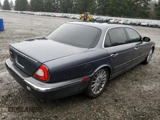 2005 Jaguar XJ VDP with VIN SAJWA82C15SG43017, listed as a Copart auction lot 83910874 with 83,352 mi miles and Salvage Title. Bid and sale history available at carsss.com. Image 3.