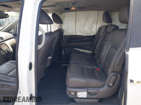2015 Honda Odyssey EX-L with VIN 5FNRL5H62FB106545, listed as a IAAI auction lot 42115849 with 122,718 mi miles and . Bid and sale history available at DreamBid. Image 8.