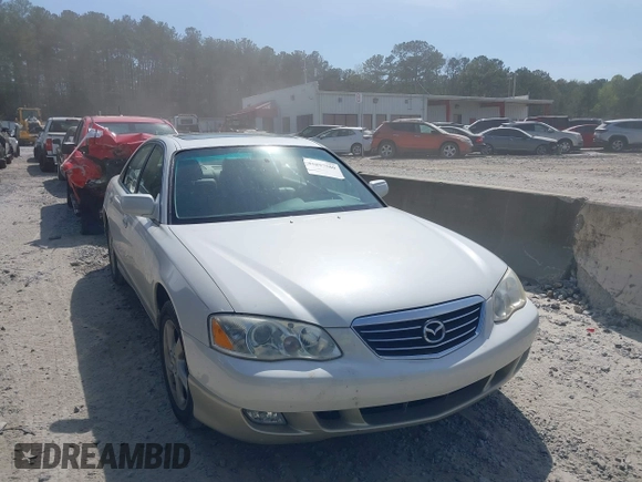 2001 Mazda Millenia with VIN JM1TA221011711379, listed as a IAAI auction lot 41897580 with 151,307 mi miles and . Bid and sale history available at DreamBid. Image 1.