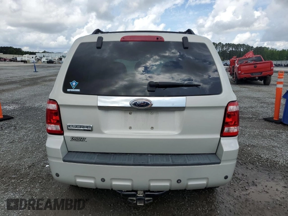 2008 Ford Escape Limited с VIN 1FMCU04138KC39185, выставлен на аукционе Copart как лот 56640295 с пробегом 149 956 миль миль и Списание • Salvage title. История ставок и продаж доступна на DreamBid. Изображение 6.