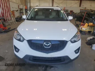 2015 Mazda CX-5 Grand Touring with VIN JM3KE4DY5F0538016, listed as a Copart auction lot 52396685 with 137,272 mi miles and Clean Title. Bid and sale history available at carsss.com. Image 5.