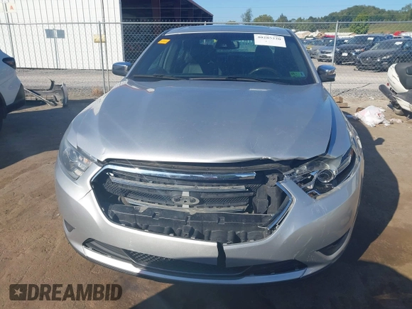 2014 Ford Taurus Limited with VIN 1FAHP2F8XEG133523, listed as a IAAI auction lot 40285220 with 134,939 mi miles. Bid and sale history available at carsss.com. Image 6.