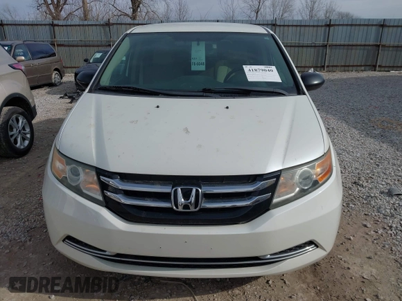 2014 Honda Odyssey LX with VIN 5FNRL5H24EB001551, listed as a IAAI auction lot 41879040 with 119,200 mi miles and . Bid and sale history available at DreamBid. Image 12.