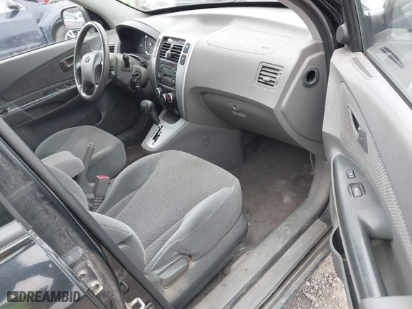 2008 Hyundai Tucson SE with VIN KM8JN72D38U767890, listed as a IAAI auction lot 41940900 with 170,080 mi miles. Bid and sale history available at carsss.com. Image 5.