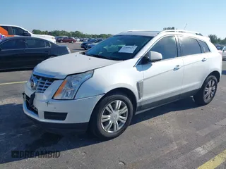 2016 Cadillac SRX Luxury Collection with VIN 3GYFNBE39GS548327, listed as a IAAI auction lot 41889611 with 140,670 mi miles. Bid and sale history available at carsss.com. Image 2.