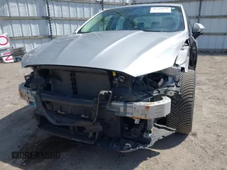 2018 Ford Fusion SE z VIN 3FA6P0H77JR226390, wystawiony jako IAAI lot #42120981 z przebiegiem 114 057 mil mil oraz . Historia ofert i sprzedaży dostępna na DreamBid. Obrazek 18.