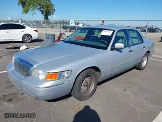 2001 Mercury Grand Marquis LS with VIN 2MEFM75W61X651798, listed as a IAAI auction lot 41867873 with 192,193 mi miles. Bid and sale history available at carsss.com. Image 2.