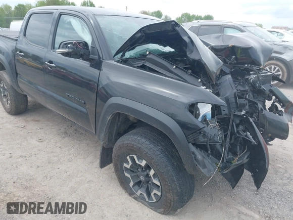 2023 Toyota Tacoma SR with VIN 3TMCZ5AN2PM598464, listed as a IAAI auction lot 42238032 with 35,597 mi miles and . Bid and sale history available at DreamBid. Image 6.