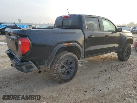 2024 GMC Canyon 4WD AT4 z VIN 1GTP6DEK5R1109902, wystawiony jako Copart lot #54504725 z przebiegiem 28 350 mil mil oraz Szkoda całkowita • Salvage title. Historia ofert i sprzedaży dostępna na DreamBid. Obrazek 3.