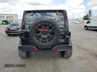 2019 Jeep Wrangler Unlimited Sahara with VIN 1C4HJXEN6KW595840, listed as a Copart auction lot 54382265 with 145,986 mi miles and Salvage Title. Bid and sale history available at carsss.com. Image 6.