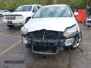 2012 Ford Focus Titanium with VIN 1FAHP3N29CL415935, listed as a IAAI auction lot 42004275 with 227,262 mi miles and . Bid and sale history available at carsss.com. Image 6.