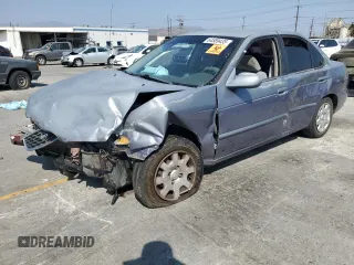 2000 Nissan Sentra XE with VIN 3N1CB51D5YL328151, listed as a Copart auction lot 64589435 with Not provided miles and Salvage title. Bid and sale history available at DreamBid. Image 1.