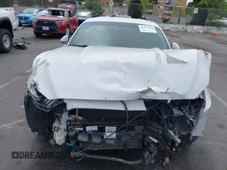 2016 Ford Mustang EcoBoost with VIN 1FA6P8THXG5206192, listed as a IAAI auction lot 42397412 with 117,656 mi miles and . Bid and sale history available at DreamBid. Image 6.