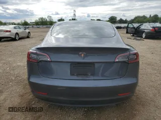 2023 Tesla Model 3 with VIN 5YJ3E1EA3PF672023, listed as a Copart auction lot 57571645 with 18,115 mi miles and Salvage title. Bid and sale history available at DreamBid. Image 6.